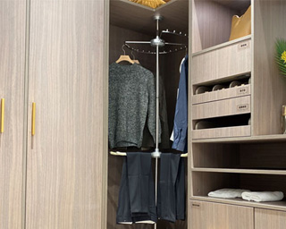 Three-layer corner clothing basket
